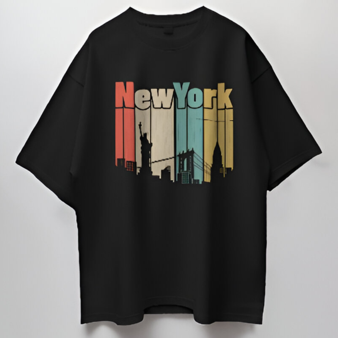 Back view of the black oversized T-shirt, plain to keep the focus on the detailed front cityscape design.
