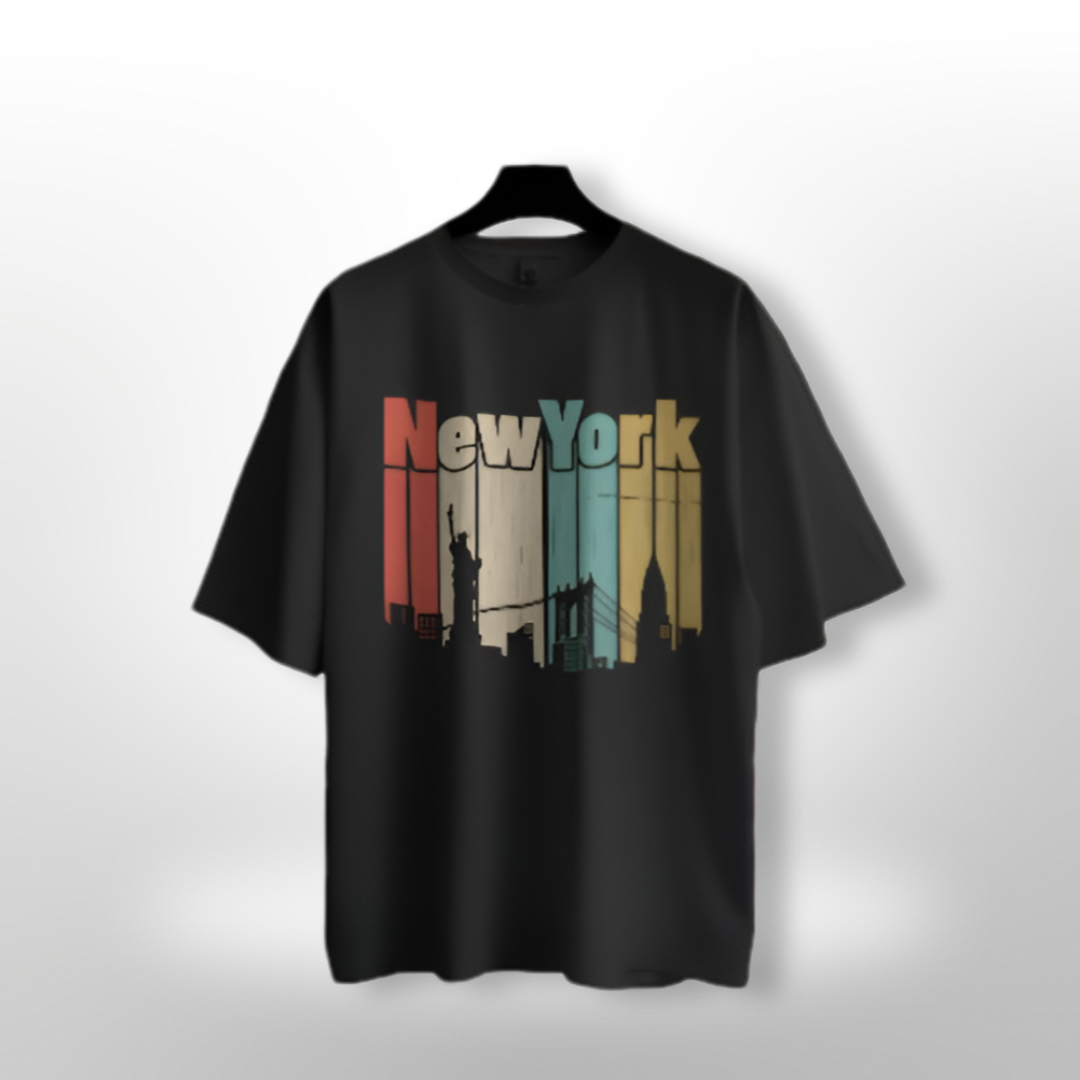 Unisex oversized T-shirt with a stylish 'New York' skyline design in monochrome on a black background.