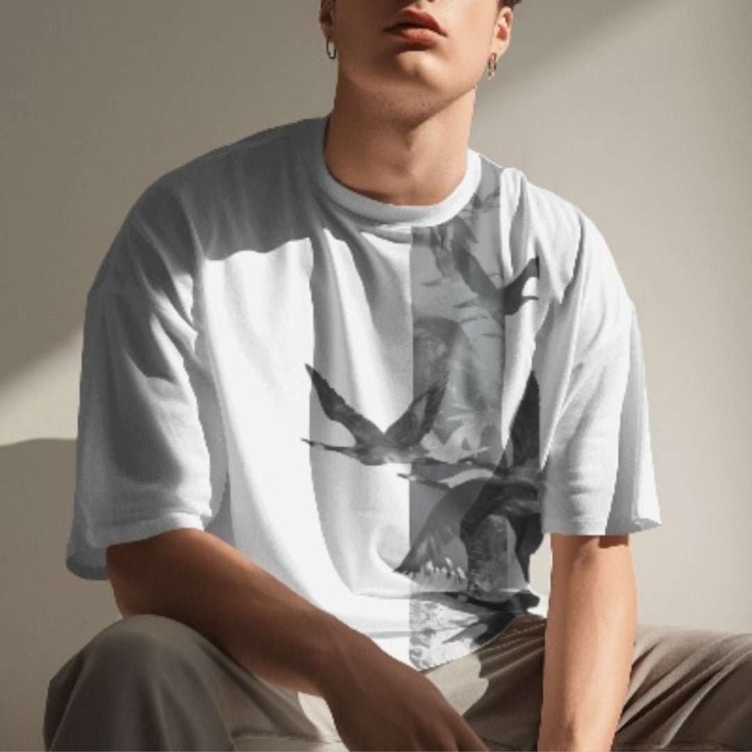 Folded view of Flying Flamingo oversized T-shirt showcasing print clarity and shirt quality.