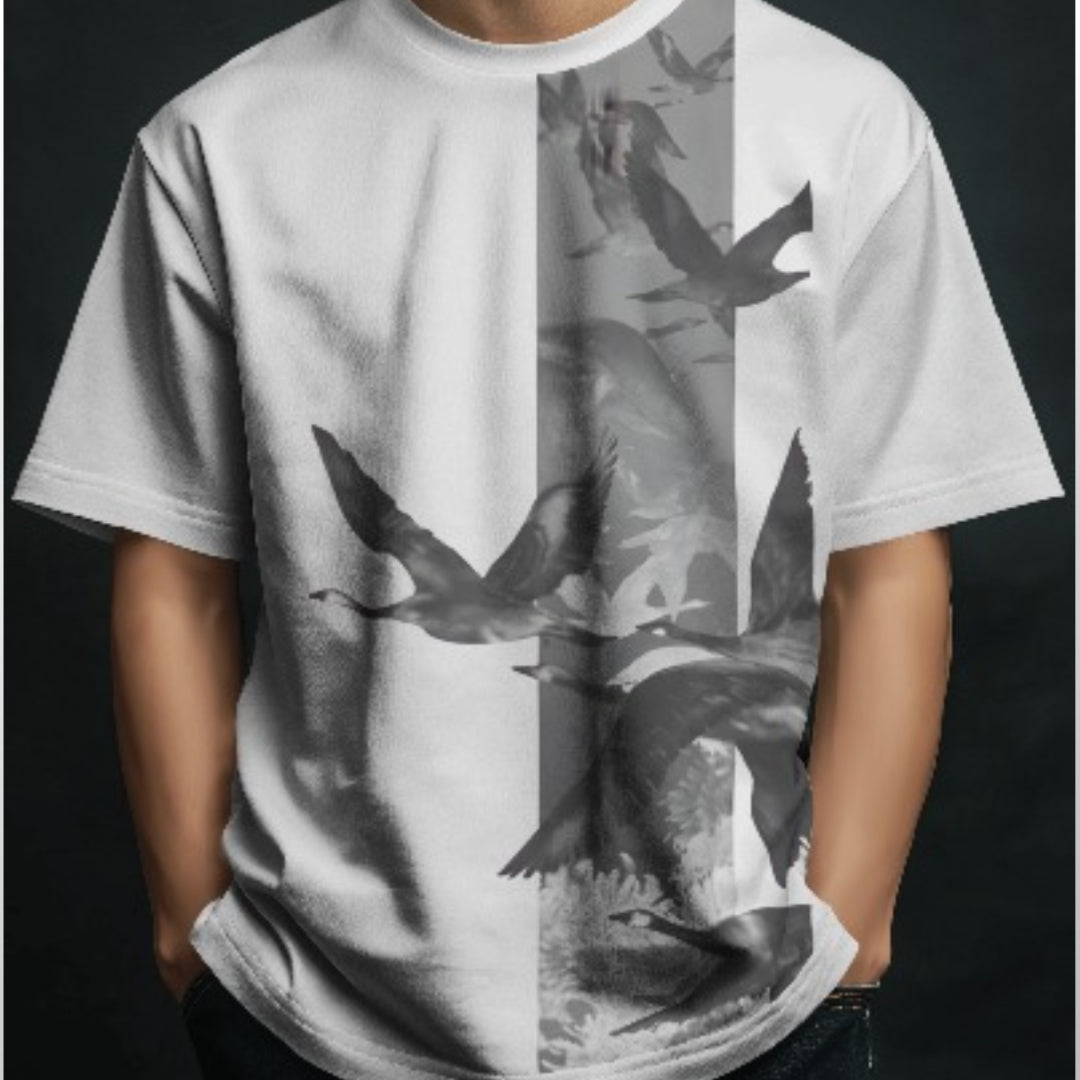 Model wearing Flying Flamingo premium oversized T-shirt, styled with light blue jeans.