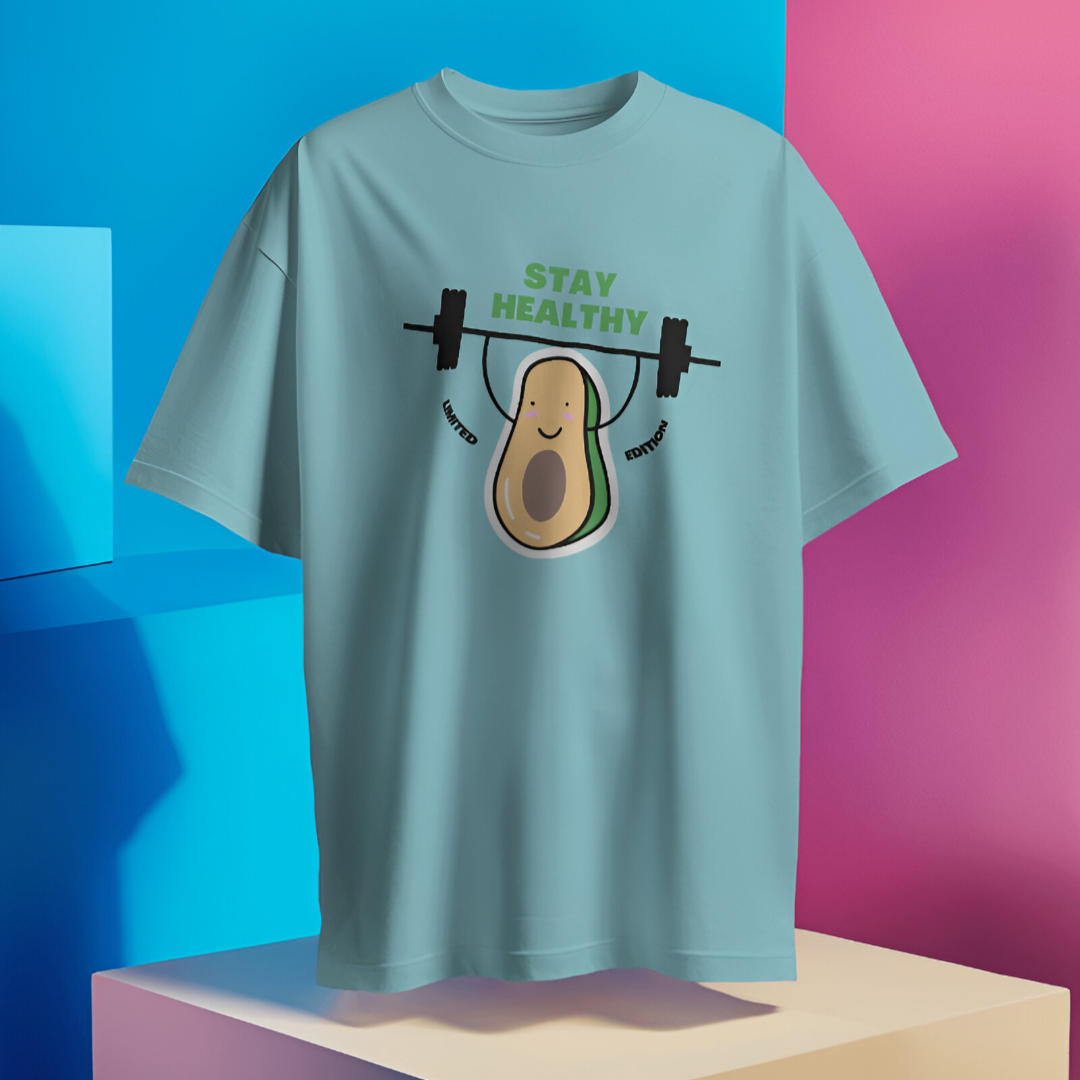 Close-up of bold 'Stay Healthy' print in black on a white oversized gym T-shirt.