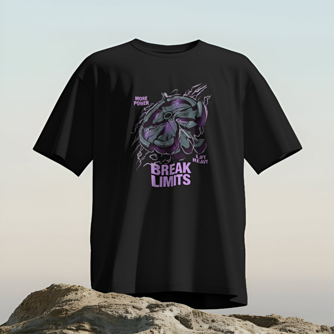 Athletic model demonstrating strength poses in the 'BREAK LIMITS' oversized gym T-shirt.