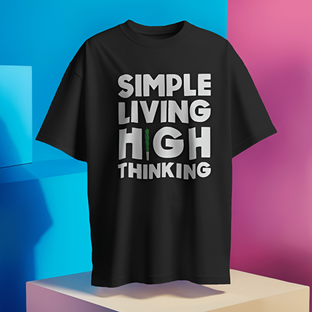 Person meditating in a serene park setting, wearing the 'Simple Living High Thinking' T-shirt.