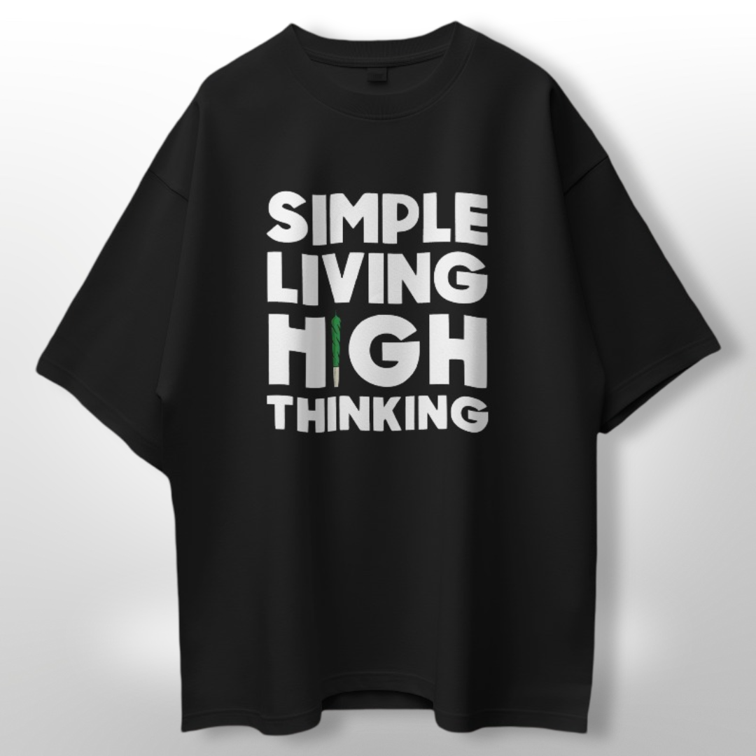 Close-up view showing the detailed script of 'Simple Living High Thinking' on oversized white T-shirt.