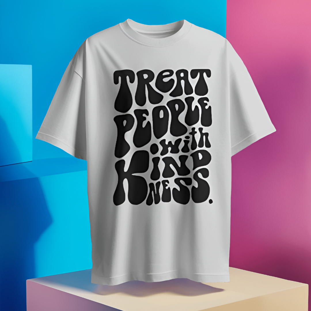 Person engaging in volunteer work at a community garden, wearing the 'Treat People with Kindness' T-shirt, promoting positivity.