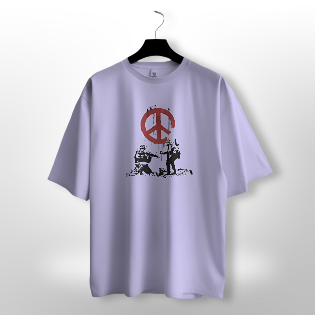 Men's 'Peace in War' slogan on an olive green oversized T-shirt with military-style graphics.