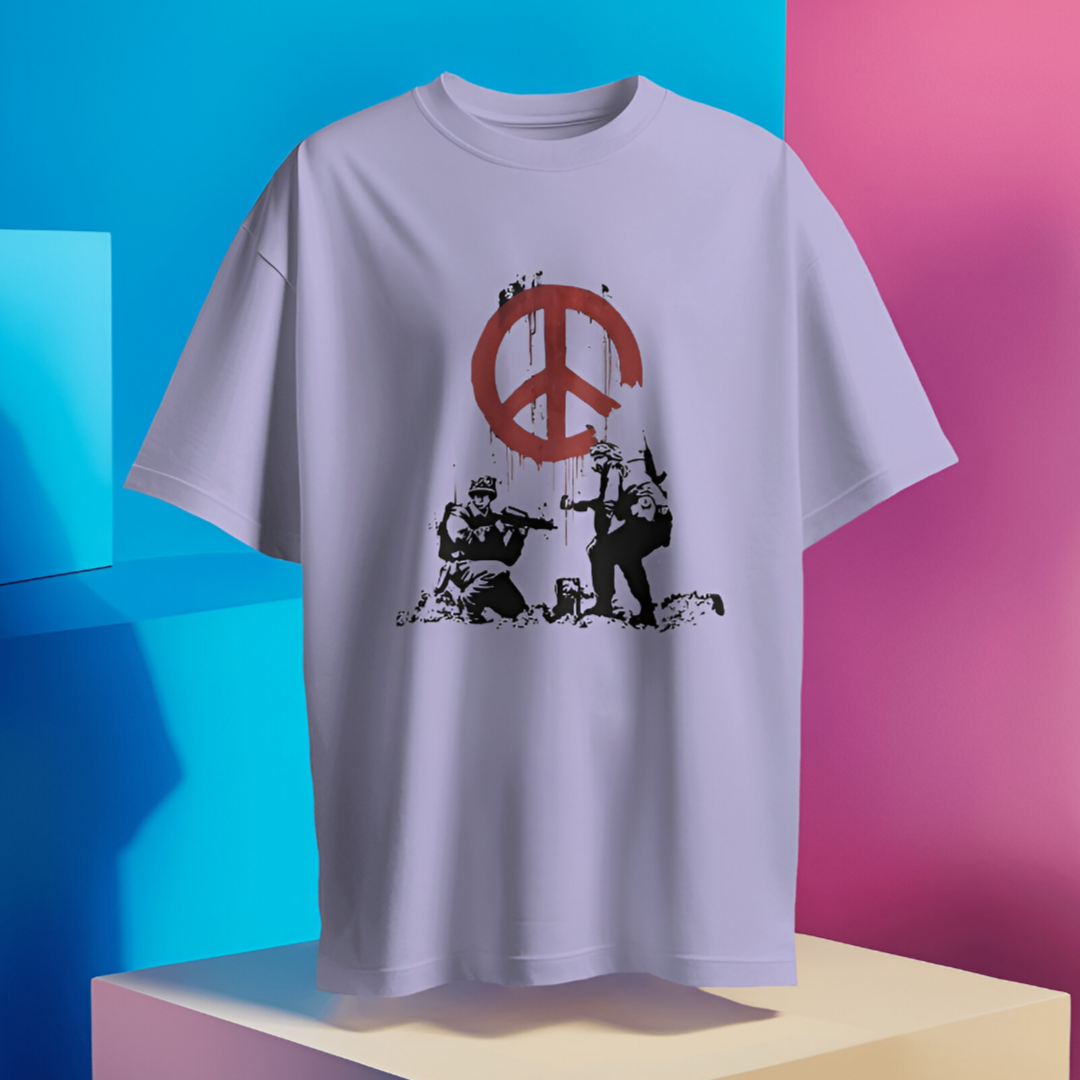 Individual wearing 'Peace in War' T-shirt at a peaceful protest, blending activism with fashion.
