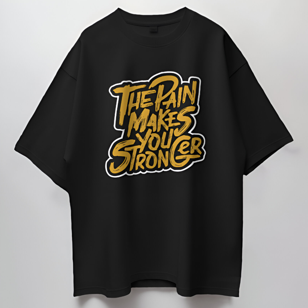 Detailed view of the 'The Pain Makes You Stronger' quote in bold white lettering on black T-shirt.