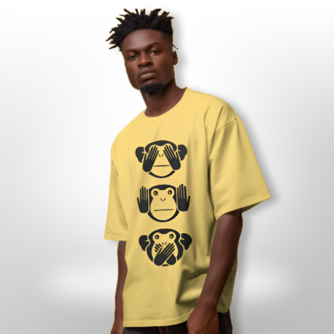 Back view of the beige oversized T-shirt, simple and clean to focus attention on the front graphic.