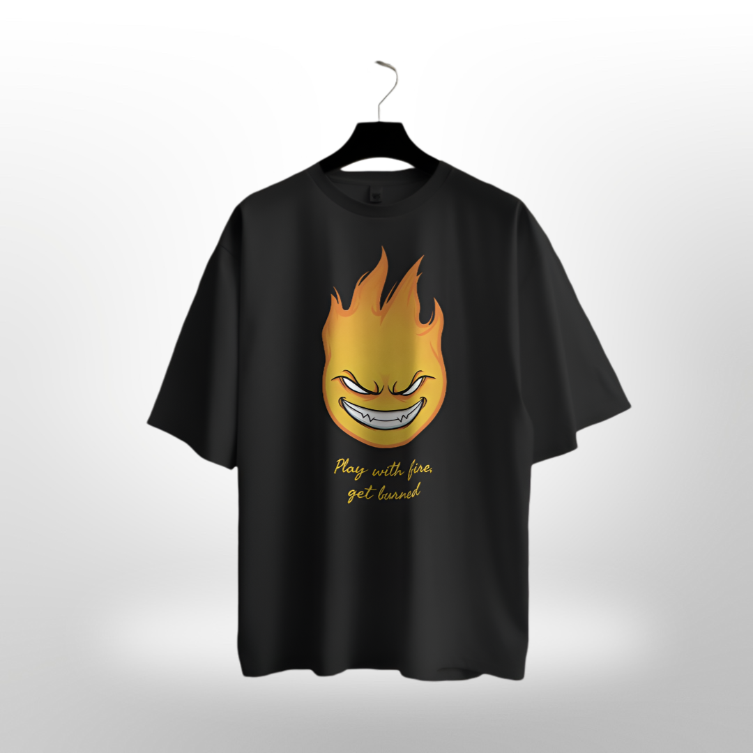 Unisex 'Play with Fire, Get Burned' slogan with fiery graphic on a black oversized T-shirt.