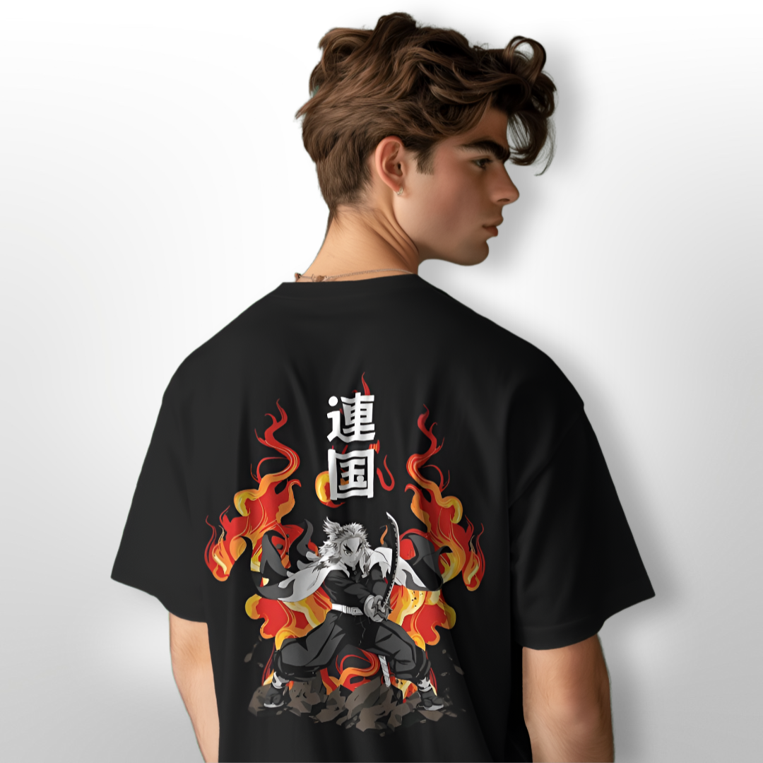 Anime fan wearing 'Set Heart to Blaze - Rengoku' T-shirt at a comic convention, surrounded by other enthusiasts.