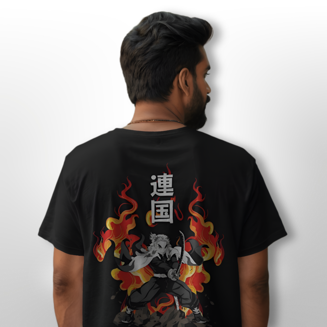 Model posing in 'Set Heart to Blaze - Rengoku' T-shirt, paired with black jeans for a bold anime-inspired look.