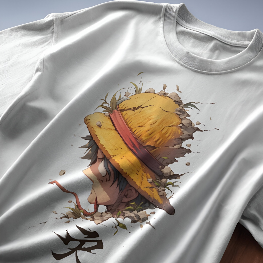 Close-up of Kid Luffy's playful and determined expression on a bright blue oversized T-shirt.